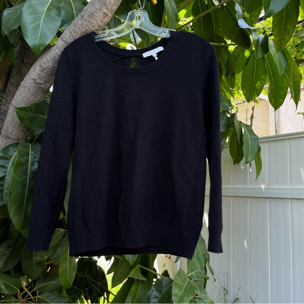 Sandro Paris Merino wool sweater with a  Keyhole Back.